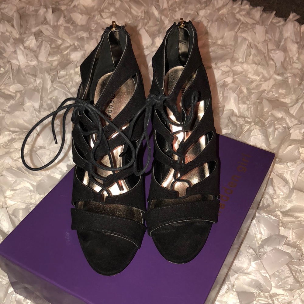 Laced up black heels